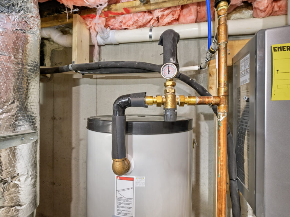 Thermostatic mixing valve regulating temperature for home's hot water to a safe level